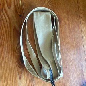 Ada leather wrap belt in excellent condition in light tan.